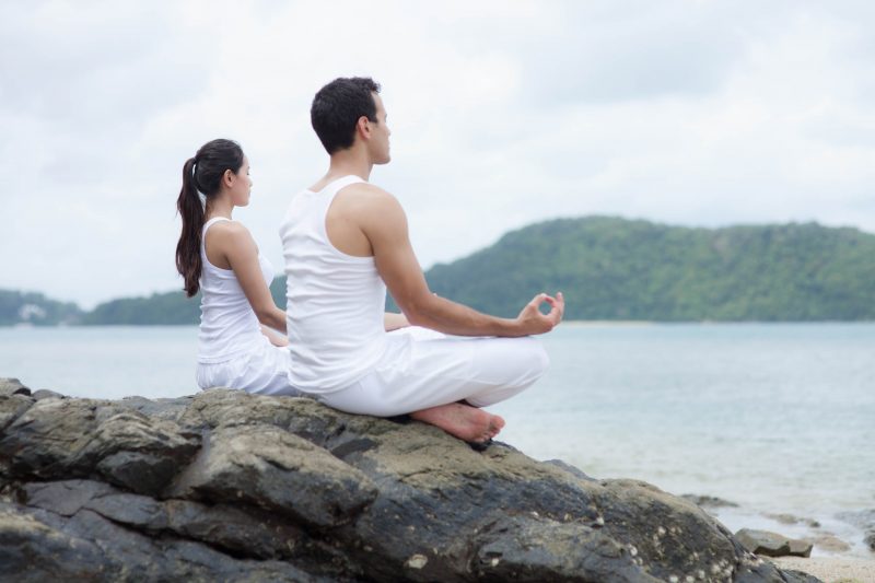 Amatara Wellness Resort couple meditation e1610718070517