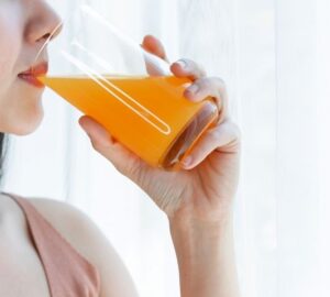 drinking orange juice
