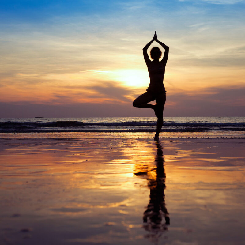 Yoga pose in sunset
